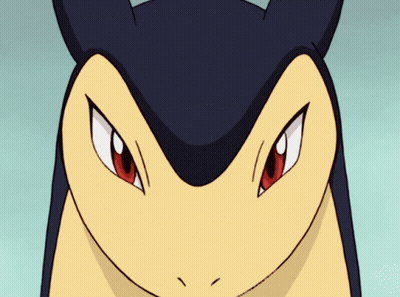 A Close Up Of A Cartoon Character 'S Face With Red Eyes And Sharp Teeth GIF