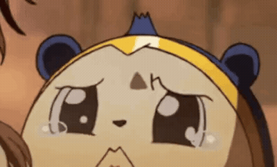 A Close Up Of A Cartoon Character 'S Face With Tears Coming Out Of It . GIF