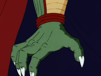 A Close Up Of A Cartoon Character 'S Hand With Long White Claws GIF