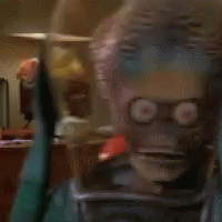 A Close Up Of A Cartoon Character 'S Head With Glasses GIF