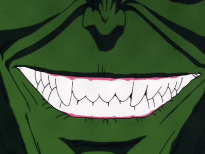 A Close Up Of A Cartoon Character 'S Mouth With Sharp Teeth And A Blue Tongue GIF