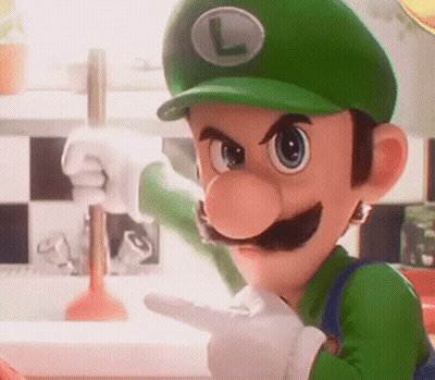A Close Up Of A Cartoon Character Wearing A Green Hat And Gloves Pointing At Something . GIF