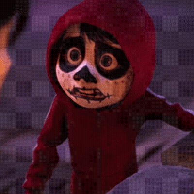 A Close Up Of A Cartoon Character Wearing A Red Hoodie With A Skeleton Face Painted On It . GIF