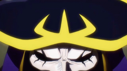 A Close Up Of A Cartoon Character Wearing A Yellow Mask GIF