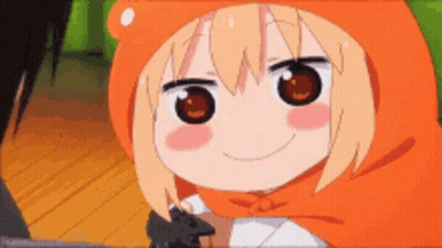 A Close Up Of A Cartoon Character Wearing An Orange Hood And Holding A Black Object . GIF
