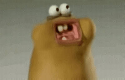 A Close Up Of A Cartoon Character With A Big Mouth And Eyes . GIF