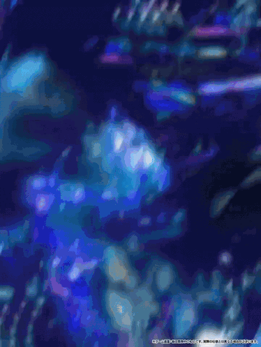 A Close Up Of A Cartoon Character With A Blue Hair GIF