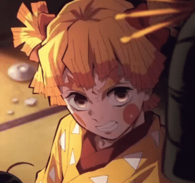 A Close Up Of A Cartoon Character With A Bow In His Hair And A Yellow Shirt . GIF