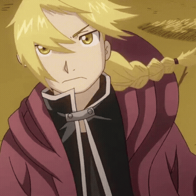A Close Up Of A Cartoon Character With A Braid And The Letter M On His Face GIF