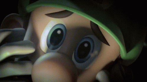 A Close Up Of A Cartoon Character With A Green Hat GIF