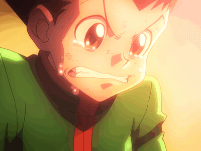 A Close Up Of A Cartoon Character With A Green Shirt And Red Tie GIF