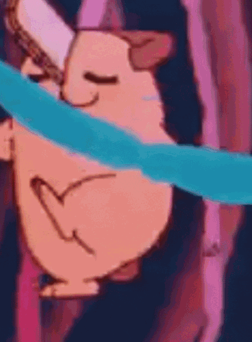 A Close Up Of A Cartoon Character With A Heart On Its Face And A Blue Ribbon Around Its Neck . GIF
