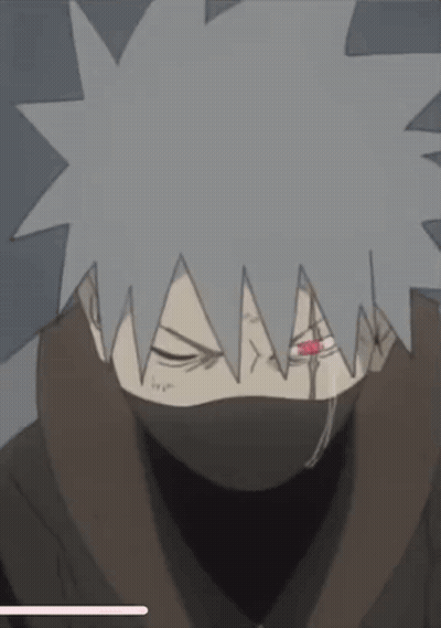 A Close Up Of A Cartoon Character With A Mask On His Face And A Red Eye . GIF