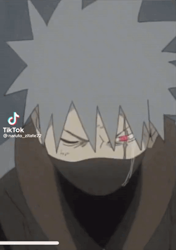 A Close Up Of A Cartoon Character With A Mask On His Face And A Red Eye . GIF