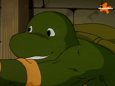 A Close Up Of A Cartoon Character With A Nickelodeon Logo In The Background GIF