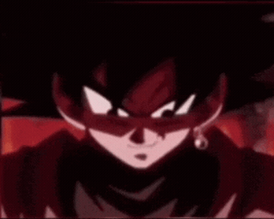 A Close Up Of A Cartoon Character With A Red Face And A Piercing In His Ear . GIF