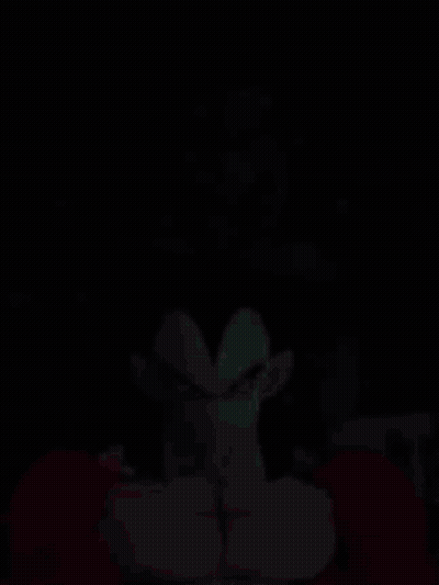A Close Up Of A Cartoon Character With A Red Scarf Around His Head GIF