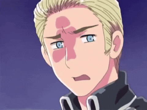 A Close Up Of A Cartoon Character With A Red Spot On His Forehead GIF