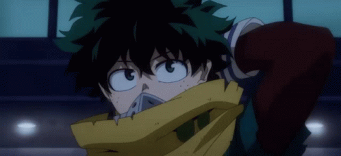 A Close Up Of A Cartoon Character With A Scarf Around His Face GIF