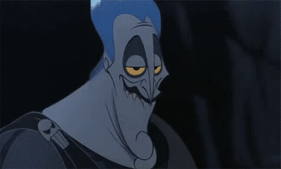 A Close Up Of A Cartoon Character With A Very Angry Face And Yellow Eyes . GIF