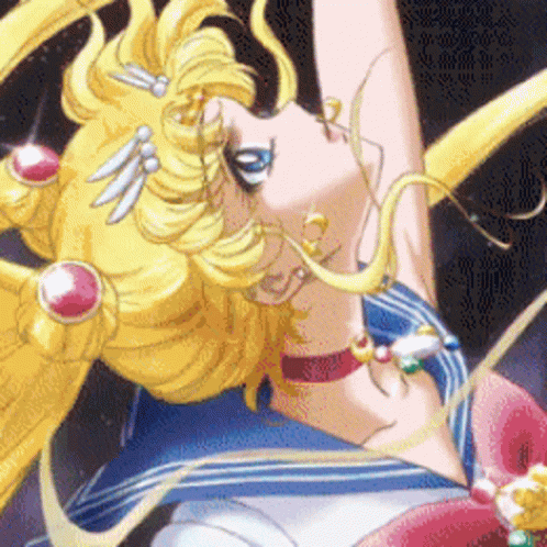A Close Up Of A Cartoon Character With A Yellow Hair And Blue Eyes GIF