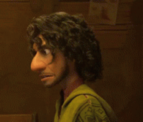 A Close Up Of A Cartoon Character With Big Eyes And A Beard . GIF