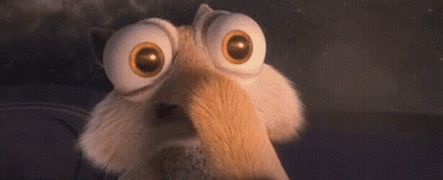 A Close Up Of A Cartoon Character With Big Eyes And A Surprised Look On His Face . GIF