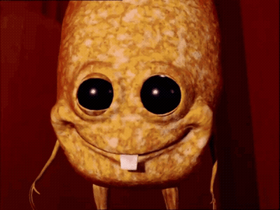 A Close Up Of A Cartoon Character With Big Eyes And A Tongue Sticking Out GIF