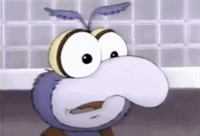 A Close Up Of A Cartoon Character With Big Eyes And Wings GIF