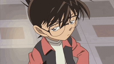 A Close Up Of A Cartoon Character With Glasses GIF