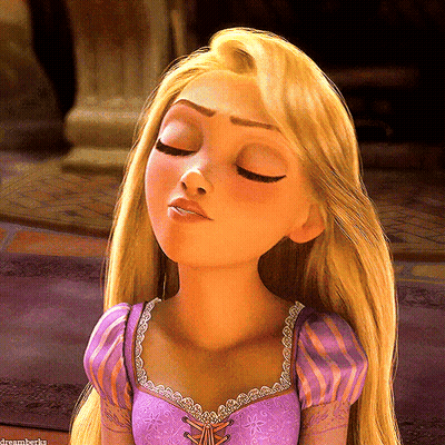 A Close Up Of A Cartoon Character With Her Eyes Closed GIF