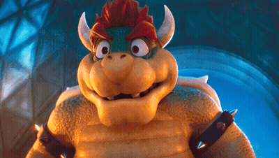 A Close Up Of A Cartoon Character With Horns And Spikes On His Arms GIF