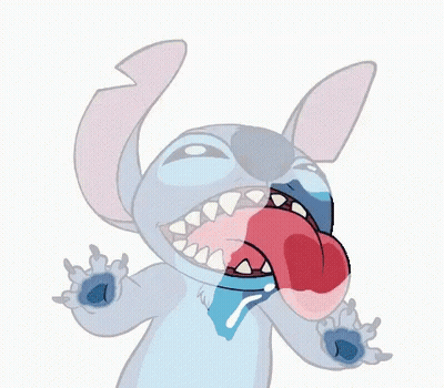 a close up of a cartoon character with its mouth open and its tongue out .
