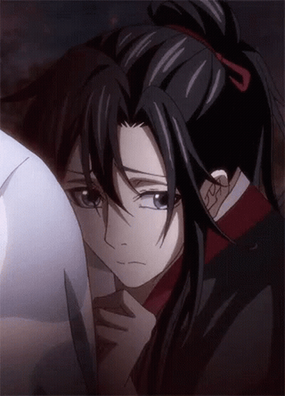 A Close Up Of A Cartoon Character With Long Hair GIF