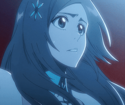 A Close Up Of A Cartoon Character With Long Hair And A Flower In Her Hair GIF