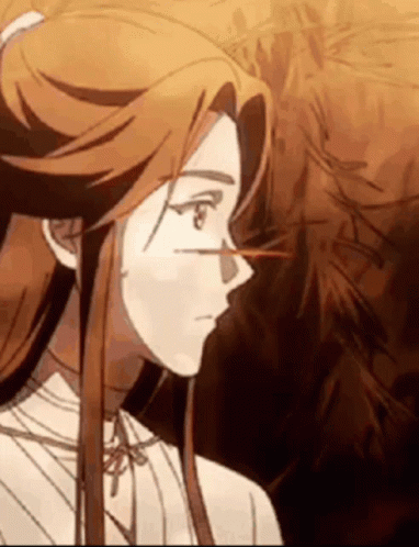 A Close Up Of A Cartoon Character With Long Hair . GIF