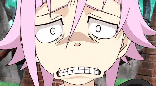 A Close Up Of A Cartoon Character With Pink Hair And White Eyes GIF