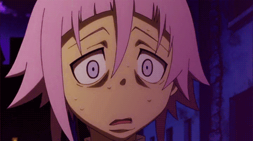 A Close Up Of A Cartoon Character With Pink Hair Making A Funny Face GIF