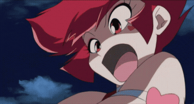 A Close Up Of A Cartoon Character With Red Hair GIF