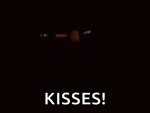 A Close Up Of A Cartoon Character With The Words Kisses On It GIF
