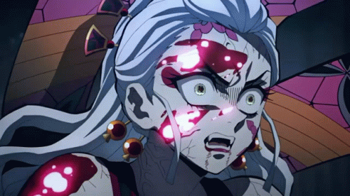 A Close Up Of A Cartoon Character With White Hair GIF