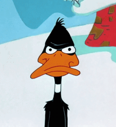 A Close Up Of A Cartoon Duck With An Angry Face . GIF