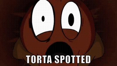 A Close Up Of A Cartoon Face With The Words " Torta Spotted " Above It GIF