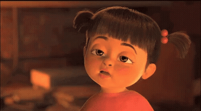 A Close Up Of A Cartoon Girl With Pigtails Looking At The Camera GIF
