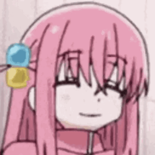A Close Up Of A Cartoon Girl With Pink Hair . GIF
