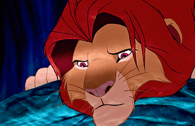 A Close Up Of A Cartoon Lion With Red Hair And Pink Eyes GIF