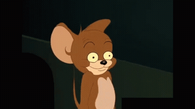 A Close Up Of A Cartoon Mouse With Big Yellow Teeth GIF