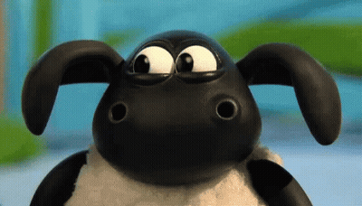 A Close Up Of A Cartoon Sheep With Big Eyes Looking At The Camera GIF