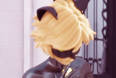 A Close Up Of A Cat Noir From Miraculous Ladybug Wearing A Cat Mask . GIF