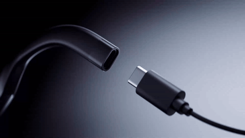 A Close Up Of A Charging Cable With The End Missing GIF